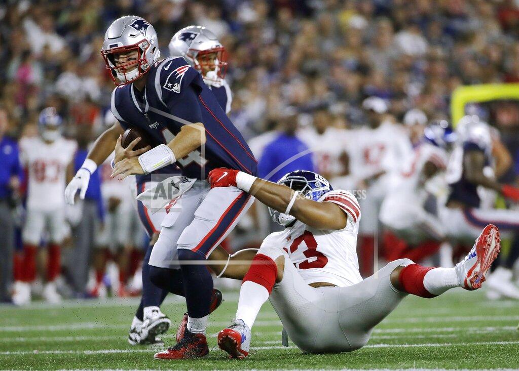 Elise Amendola New York Giants middle linebacker B.J. Goodson (93) sacks New England Patriots quarterback Jarrett Stidham (4) in the first half of an NFL preseason football game, Thursday, Aug. 29, 2019, in Foxborough, Mass. (AP Photo/Elise Amendola)