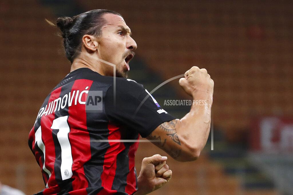Antonio Calanni FILE - In this Sept. 21, 2020 file photo, AC Milan's Zlatan Ibrahimovic reacts during the Serie A soccer match between AC Milan and Bologna at the San Siro stadium, in Milan, Italy. It will be a strange atmosphere at San Siro when Inter Milan hosts city rival AC Milan on Saturday with only 1,000 fans allowed in because of the coronavirus pandemic. One player who is almost certain to be on the field is Milan forward Zlatan Ibrahimović, who returned to training this week after recovering from the virus. (AP Photo/Antonio Calanni)
