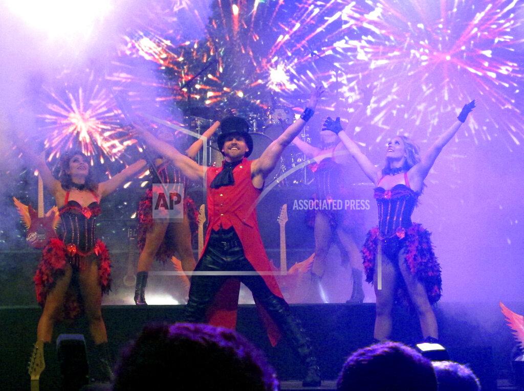 Entertainers perform onstage at the Hard Rock casino in Atlantic City, N.J. on June 28, 2018. Atlantic City's casinos are slowly resuming live entertainment, bringing back a staple of the casino experience as they comply with government-mandated restrictions designed to slow the spread of the coronavirus. (AP Photo/Wayne Parry)