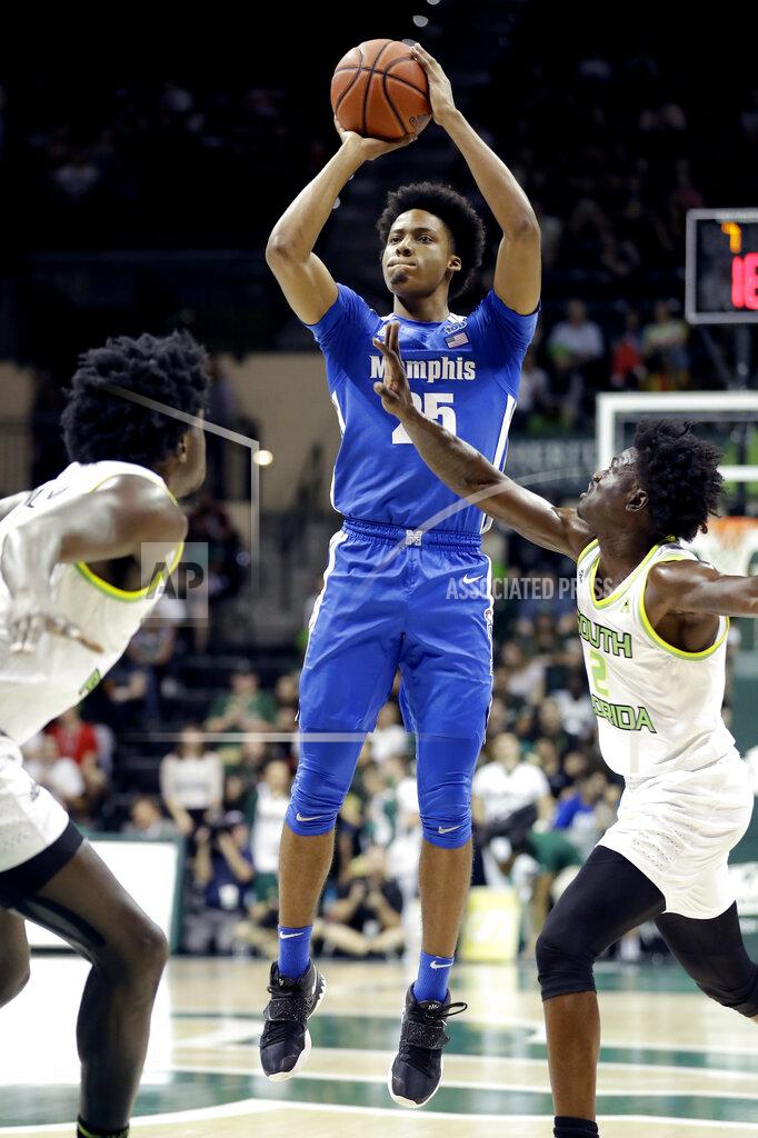 Chris O'meara Memphis guard Jayden Hardaway (25) shoots over South Florida guard Ezacuras Dawson III (2) during the first half of an NCAA college basketball game Sunday, Jan. 12, 2020, in Tampa, Fla. (AP Photo/Chris O'Meara)