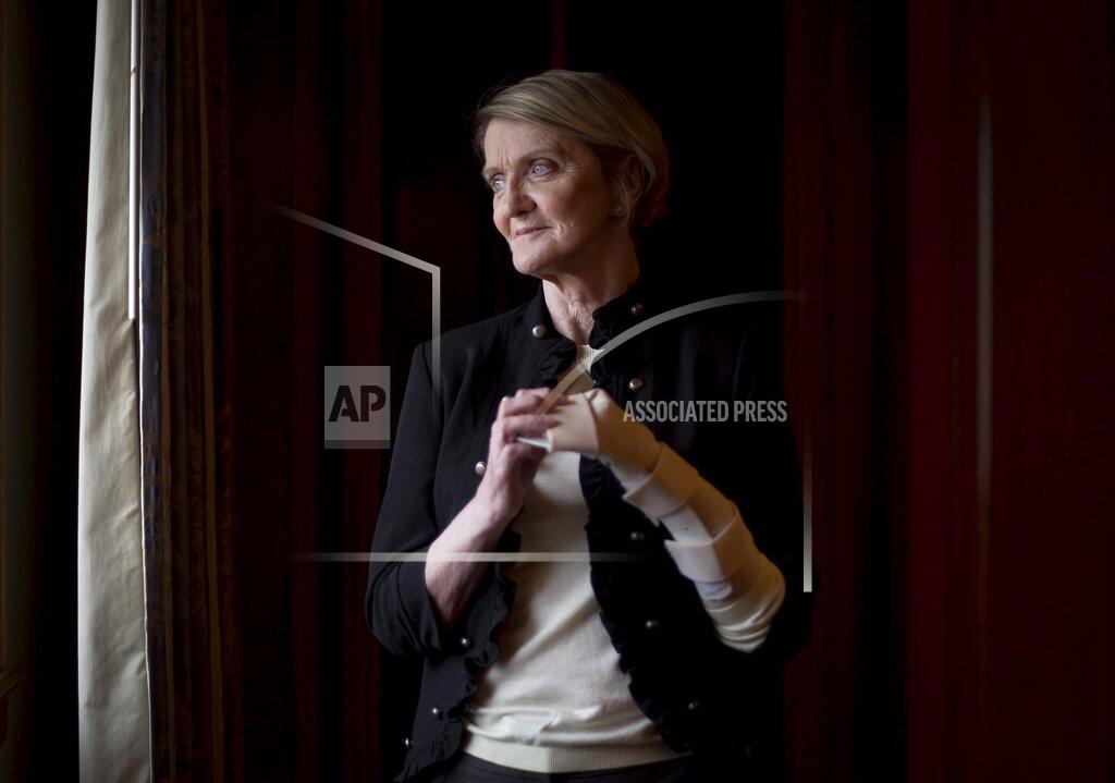 Darren Calabrese FILE - In this Dec. 2, 2014 file photo, Associated Press journalist Kathy Gannon poses for a photograph in Toronto. Afghanistan's highest court has ruled that the police officer convicted of murdering Associated Press photographer Anja Niedringhaus and wounding Gannon almost one year ago, should serve 20 years in prison, according to documents sent to the country's attorney general on Saturday, March 28, 2015. The final sentence for former Afghan police unit commander Naqibullah was reduced from the death penalty recommended by a primary court last year. Twenty years in prison is the maximum jail sentence in Afghanistan, said Zahid Safi, a lawyer for The Associated Press who had been briefed on the decision by the Supreme Court. (Darren Calabrese/The Canadian Press via AP, File)