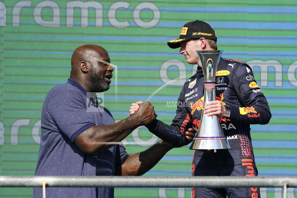 Darron Cummings Red Bull driver Max Verstappen, right, of the Netherlands, is congratulated by Shaquille O'Neal after winning the Formula One U.S. Grand Prix auto race at Circuit of the Americas, Sunday, Oct. 24, 2021, in Austin, Texas. (AP Photo/Darron Cummings)