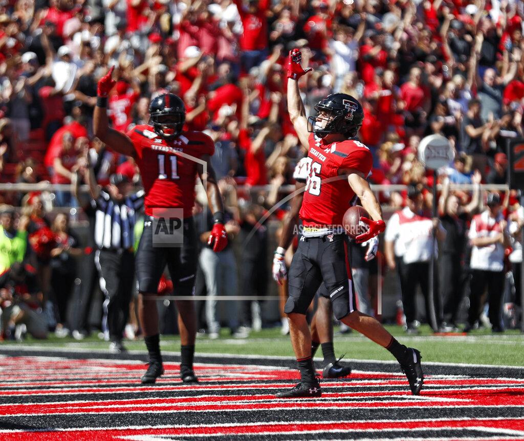 Brad Tollefson Texas Tech's Dalton Rigdon (86) celebrates after scoring a touchdown during the second half of an NCAA college football game against Oklahoma State, Saturday, Oct. 5, 2019, in Lubbock, Texas. (AP Photo/Brad Tollefson)
