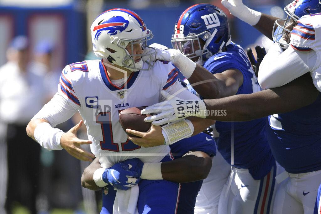 Bill Kostroun Buffalo Bills quarterback Josh Allen, left, is sacked during the first half of an NFL football game against the New York Giants, Sunday, Sept. 15, 2019, in East Rutherford, N.J. (AP Photo/Bill Kostroun)