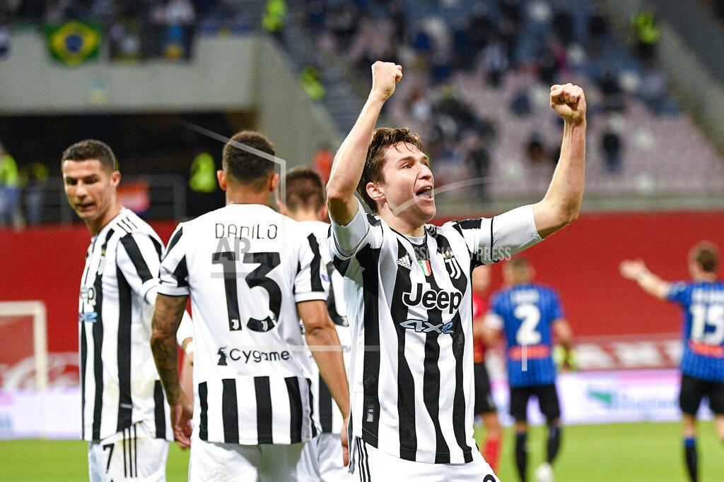 Fabrizio Corradetti Juventus' Federico Chiesa, right, celebrates his goal with his teammates against Atalanta during the Italian Cup soccer final match between Atalanta and Juventus at the Mapei Stadium in Reggio Emilia, Italy, Wednesday, May 19, 2021. (Fabrizio Corradetti/LaPresse via AP)