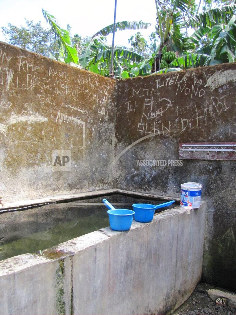 Uncredited This 2017 photo provided to The Associated Press shows the bathing area at the Topu Honis children's shelter in Kutet, East Timor. All of the accusers said the Rev. Richard Dashbach regularly oversaw the girls’ showers. They said all of the children removed their clothes and stood together naked around this large concrete water basin, with the nude priest going from girl to girl shampooing their hair and splashing water on their private parts. (AP Photo)