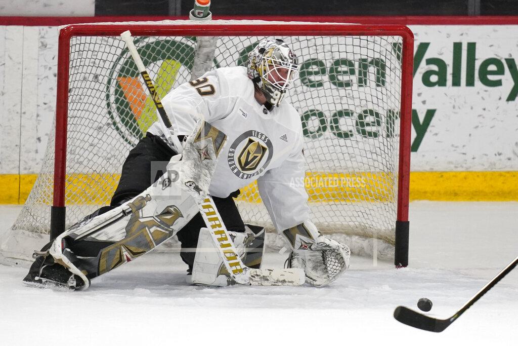 John Locher Vegas Golden Knights goaltender Robin Lehner (90) blocks a shot during an NHL hockey training camp Wednesday, Jan. 6, 2021, in Las Vegas. (AP Photo/John Locher)