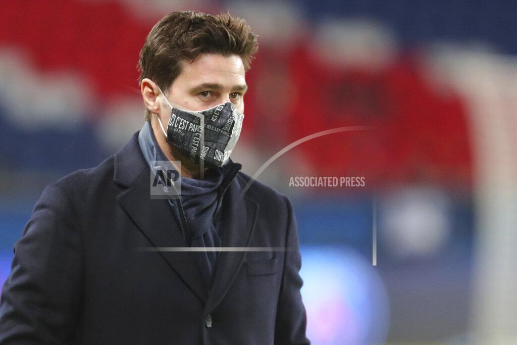 Thibault Camus PSG's head coach Mauricio Pochettino looks at the field during the French League One soccer match between Paris Saint-Germain and Montpellier at the Parc des Princes stadium in Paris, France, Friday, Jan.22, 2021. (AP Photo/Thibault Camus)