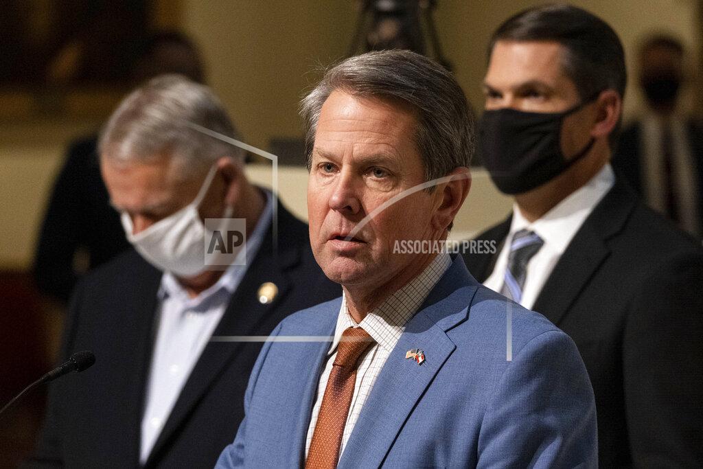 Ben Gray Georgia Gov. Brian Kemp, center, Speaker of the House David Ralston and Lt. Gov. Geoff Duncan hold a press conference Wednesday evening, Jan. 6, 2021, at the Georgia State Capitol in Atlanta, to condemn the breach of the U.S. Capitol. (AP Photo/Ben Gray)
