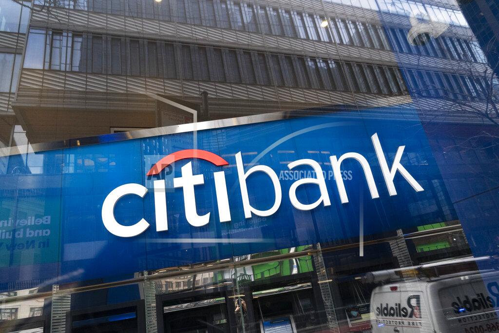 Mark Lennihan A Citibank office is open, Wednesday, Jan. 13, 2021 in New York. Citigroup Inc. says earnings for the fourth quarter of 2020 fell 7% to $4.63 billion. The New York-based bank said it had earnings of $2.08 per share, down from $2.15 per share a year earlier. (AP Photo/Mark Lennihan)