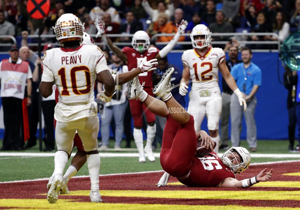 Eric Gay Washington State quarterback Gardner Minshew (16) dives into the end zone to score a touchdown against Iowa State during the the first half of the Alamo Bowl NCAA college football game Friday, Dec. 28, 2018, in San Antonio. (AP Photo/Eric Gay)
