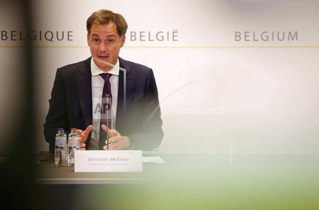 Olivier Matthys Belgium's Prime Minister Alexander De Croo speaks during a media conference after a Belgian government meeting to discuss coronavirus, COVID-19, measures in Brussels, Tuesday, May 11, 2021. (AP Photo/Olivier Matthys, Pool)