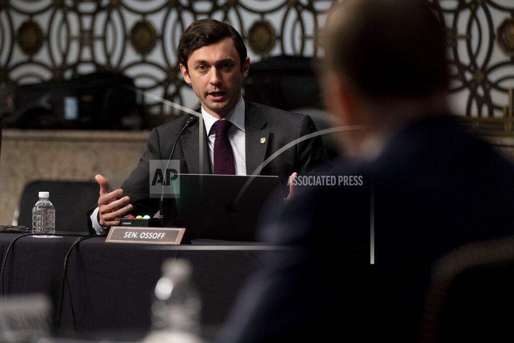 Andrew Harnik Sen. Jon Ossoff, D-Ga., questions former U.S. Capitol Police Chief Steven Sund, foreground, during a Senate Homeland Security and Governmental Affairs & Senate Rules and Administration joint hearing on Capitol Hill, Washington, Tuesday, Feb. 23, 2021, to examine the January 6th attack on the Capitol. (AP Photo/Andrew Harnik, Pool)