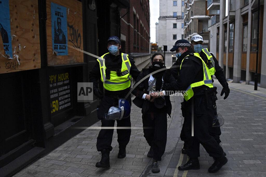 Alberto Pezzali A man is detained during clashes following a 'Kill the Bill' protest in London, Saturday, April 3, 2021. The demonstration is against the contentious Police, Crime, Sentencing and Courts Bill, which is currently going through Parliament and would give police stronger powers to restrict protests. (AP Photo/Alberto Pezzali)