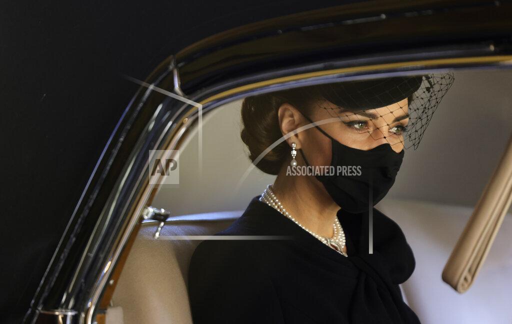 Chris Jackson Kate, Duchess of Cambridge looks out from a car window as she arrives for the funeral of Britain's Prince Philip inside Windsor Castle in Windsor, England, Saturday, April 17, 2021. Prince Philip died April 9 at the age of 99 after 73 years of marriage to Britain's Queen Elizabeth II. (Chris Jackson/Pool via AP)