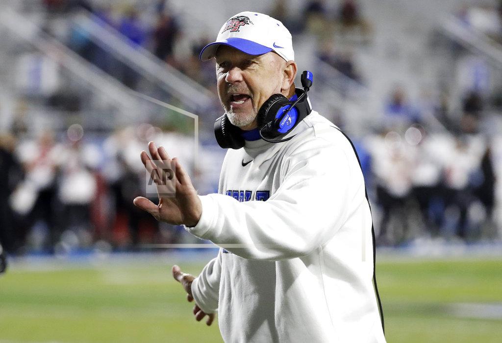 Mark Humphrey FILE - In this Nov. 2, 2018, file photo, Middle Tennessee head coach Rick Stockstill congratulates his players after a touchdown against Western Kentucky in the first half of an NCAA college football game, in Murfreesboro, Tenn. Sun Belt Conference champion Appalachian State is playing in a bowl during a time of transition for its coaching staff. Middle Tennessee coach Rick Stockstill wants his quarterback son to go out a winner. Those are just two story lines surrounding Saturday night's New Orleans Bowl. (AP Photo/Mark Humphrey, File)