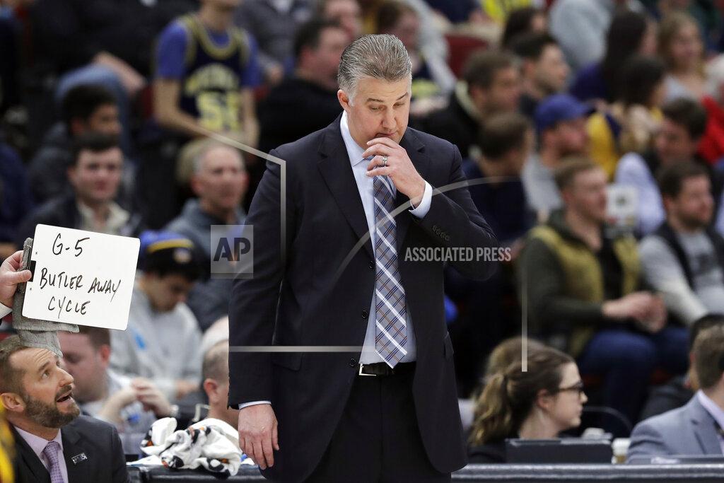 Nam Y. Huh Purdue head coach Matt Painter right looks down during the second half of an NCAA college basketball game against Minnesota in the quarterfinals of the Big Ten Conference tournament, Friday, March 15, 2019, in Chicago. Minnesota won 75-73. (AP Photo/Nam Y. Huh)