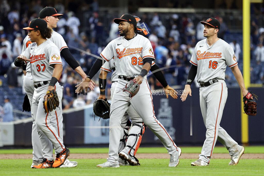 Adam Hunger Baltimore Orioles third baseman Kelvin Gutierrez (82) celebrates with teammates after they defeated the New York Yankees in a baseball game on Sunday, Sept. 5, 2021, in New York. (AP Photo/Adam Hunger)