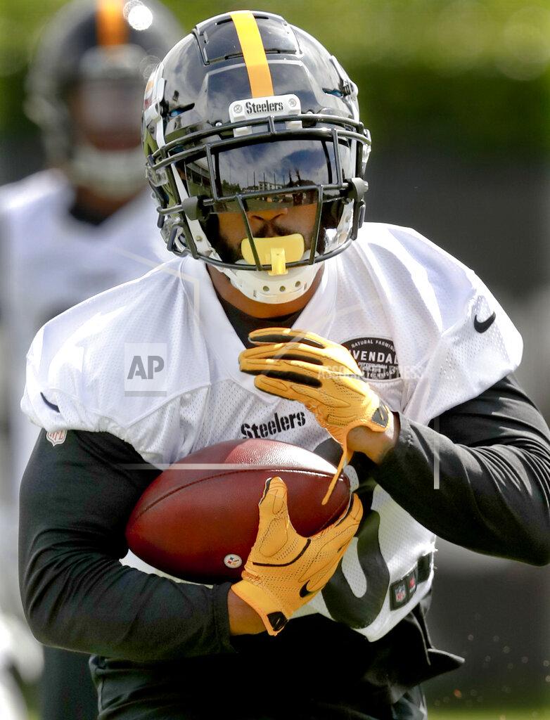 Keith Srakocic FILE - This May 21, 2019, file photo shows Pittsburgh Steelers running back Jaylen Samuels (38) performing drills during an NFL football practice in Pittsburgh. Teammate James Conner is now entrenched as the starter entering his third season, but welcomes the chance to share the load with Samuels and rookie Benny Snell Jr. (AP Photo/Keith Srakocic)