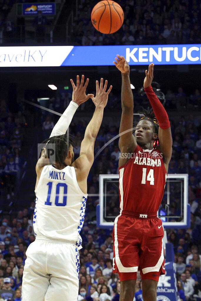 James Crisp Alabama's Keon Ellis (14) shoots while pressured by Kentucky's Davion Mintz (10) during the second half of an NCAA college basketball game in Lexington, Ky., Saturday, Feb. 19, 2022. Kentucky won 90-81. (AP Photo/James Crisp)