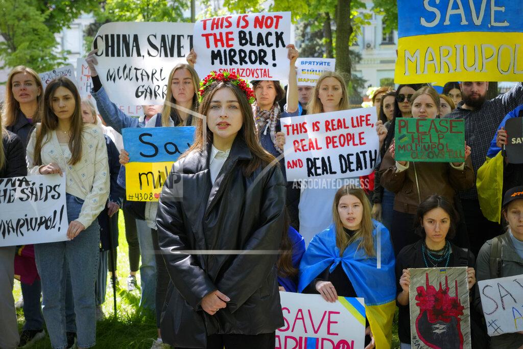 Efrem Lukatsky Ukrainian women picket in front of the Chinese embassy in Kyiv, Ukraine, Tuesday, May 17, 2022. Wives and mothers of the defenders of Mariupol call on Turkish President Recep Tayyip Erdogan and Chinese President Xi Jinping to save Ukrainian fighters from the besieged city of Mariupol amid Russia's war. (AP Photo/Efrem Lukatsky)