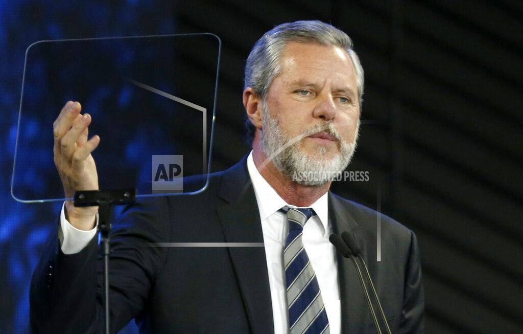FILE - In this Nov. 28, 2018, file photo, Liberty University President Jerry Falwell Jr. speaks before a convocation at Liberty University in Lynchburg, Va. Nearly three dozen black alumni of Liberty University are denouncing school President Jerry Falwell Jr. on Monday, June 1, 2020, suggesting he step down after he mocked Virginia’s mask-wearing requirement by invoking the blackface scandal that engulfed the state’s governor last year. (AP Photo/Steve Helber, File)