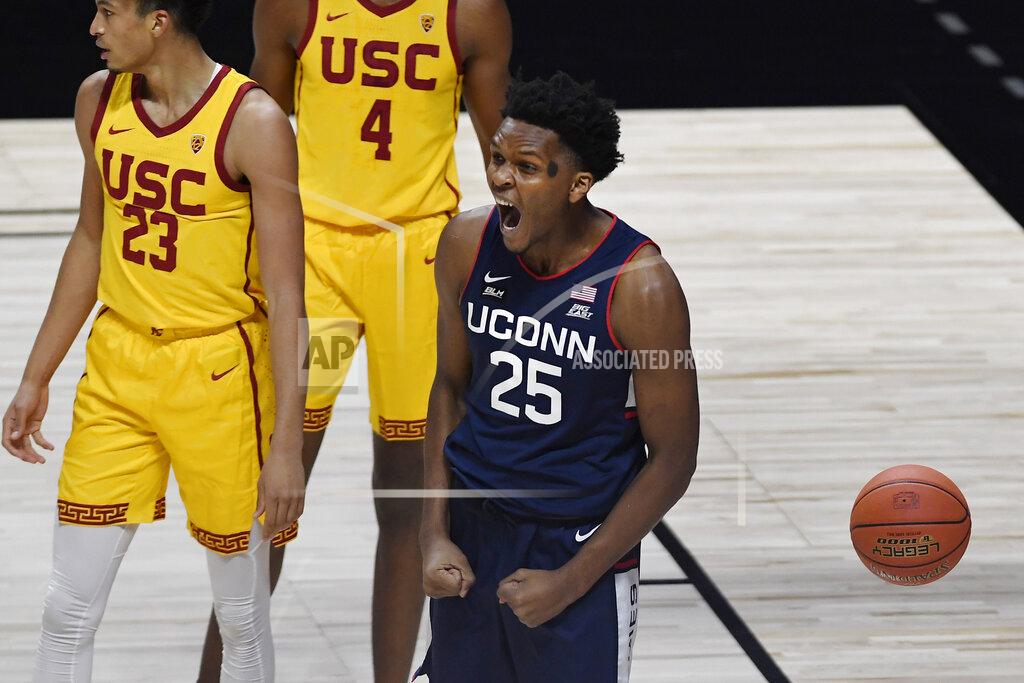 Jessica Hill Connecticut's Josh Carlton (25) reacts to a call in UConn's favor during the first half of an NCAA college basketball game against Southern California, Thursday, Dec. 3, 2020, in Uncasville, Conn. (AP Photo/Jessica Hill)