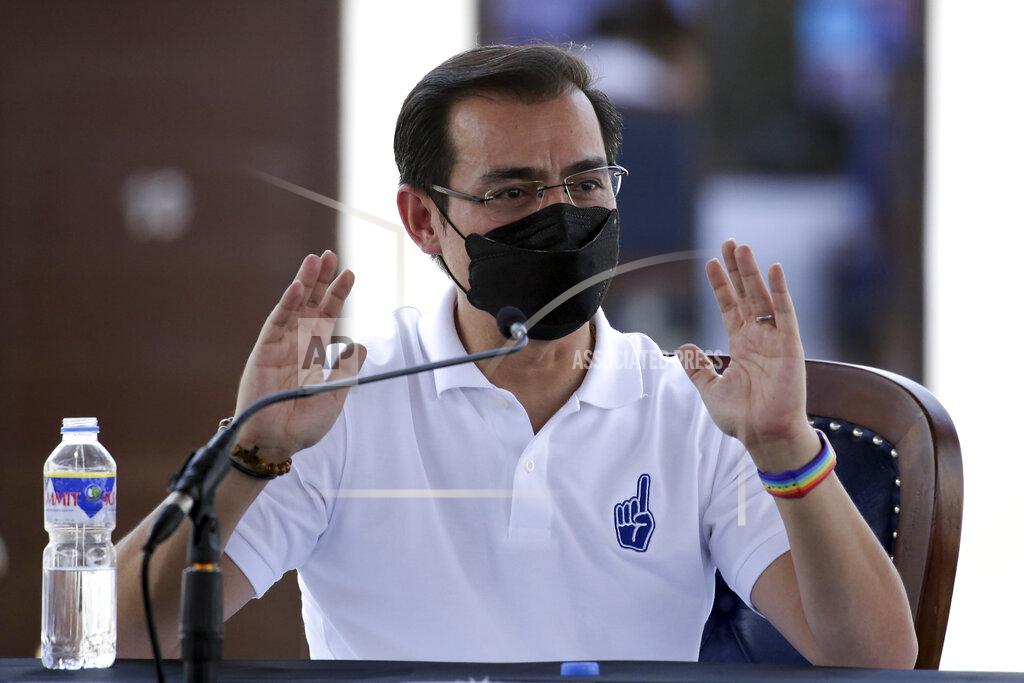 Uncredited Manila Mayor Isko Moreno answers questions after he declared his bid to run for president in a speech at a public school in the slum area near the place where he grew up in Manila, Philippines on Wednesday Sept. 22, 2021. The popular mayor of the Philippine capital said Wednesday he will run for president in next year's elections, the latest aspirant in what is expected to be a crowded race to succeed the controversial Rodrigo Duterte. (AP Photo)