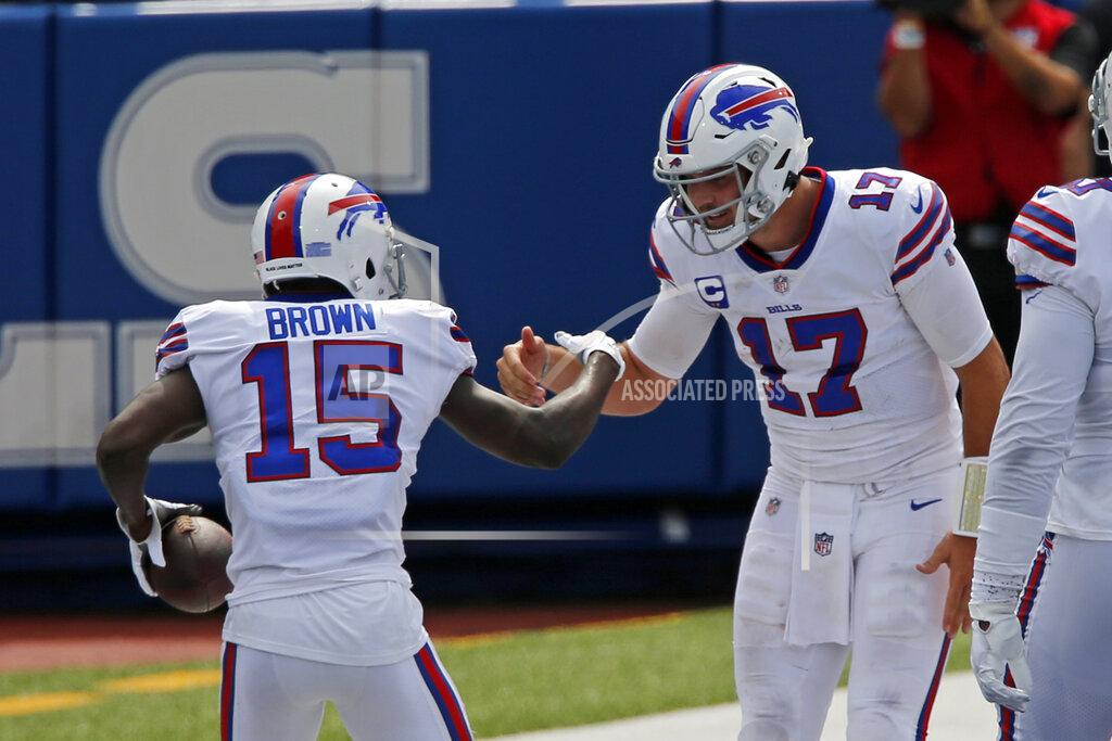 Jeffrey T. Barnes Buffalo Bills wide receiver John Brown (15) celebrates with quarterback Josh Allen after they connected on a pass play for a touchdown during the first half of an NFL football game against the New York Jets in Orchard Park, N.Y., Sunday, Sept. 13, 2020. (AP Photo/Jeffrey T. Barnes)
