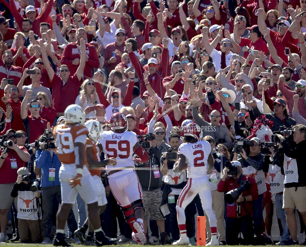 Nick Wagner Oklahoma wide receiver CeeDee Lamb (2) celebrates a touchdown against Texas during the first half of an NCAA college football game at the Cotton Bowl, Saturday, Oct. 12, 2019, in Dallas. (Nick Wagner/Austin American-Statesman via AP)