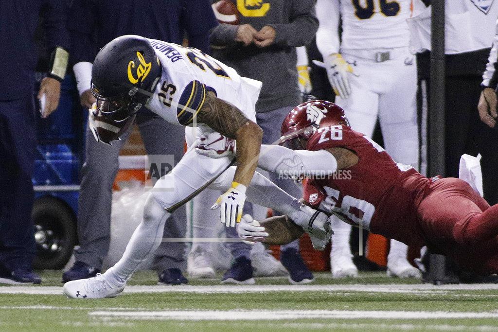 Young Kwak Washington State defensive back Hunter Dale (26) tackles California wide receiver Nikko Remigio (25) during the second half of an NCAA college football game in Pullman, Wash., Saturday, Nov. 3, 2018. Washington State won 19-13. (AP Photo/Young Kwak)