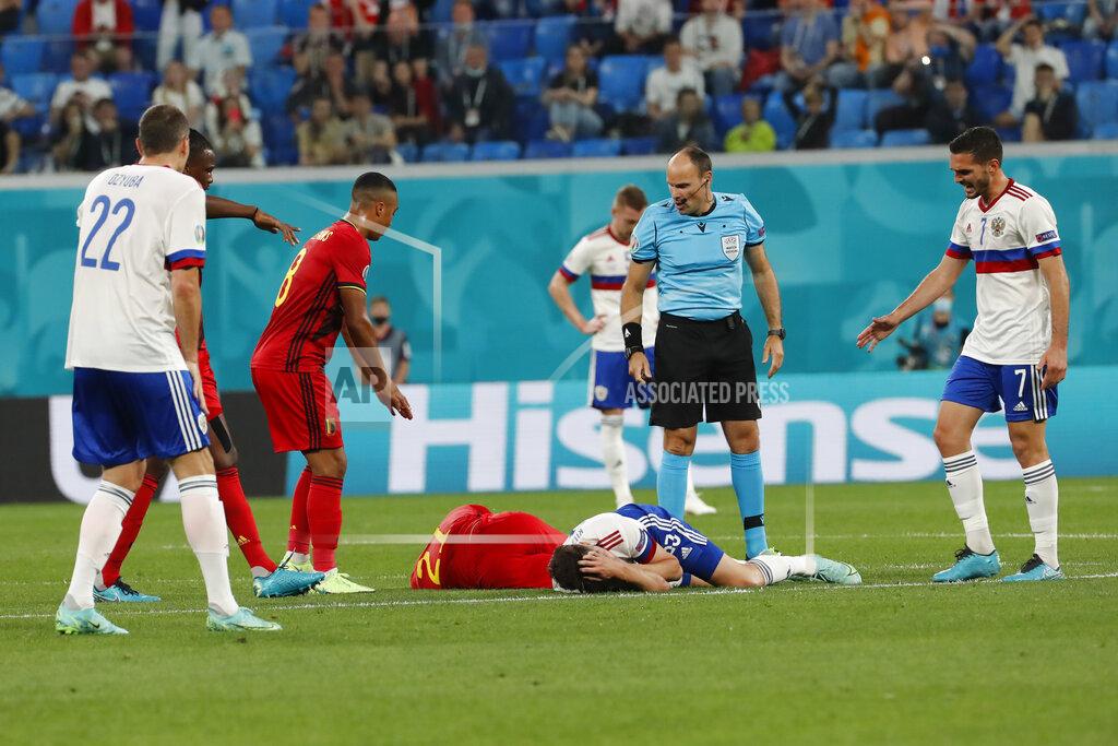 Anatoly Maltsev Belgium's Timothy Castagne, left, and Russia's Daler Kuzyayev, grimace in pain on the pitch after injuring during a header during the Euro 2020 soccer championship group B match between Belgium and Russia at the Saint Petersburg stadium in St. Petersburg, Russia, Saturday, June 12, 2021. (Anatoly Maltsev/Pool via AP)