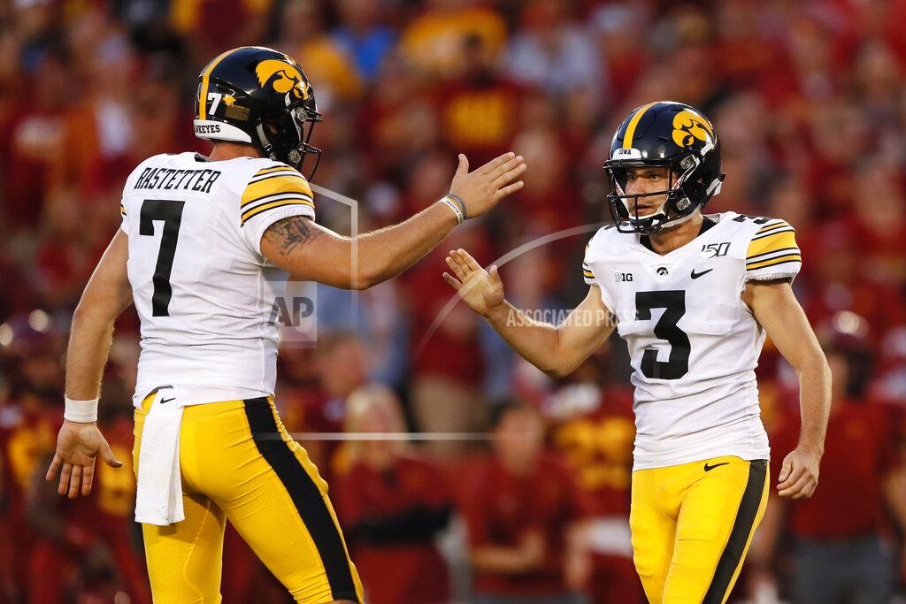 Charlie Neibergall Iowa's Keith Duncan (3) celebrates with Colten Rastetter, left, after kicking a field goal during the first half of an NCAA college football game against Iowa State, Saturday, Sept. 14, 2019, in Ames, Iowa. Iowa won 18-17. (AP Photo/Charlie Neibergall)