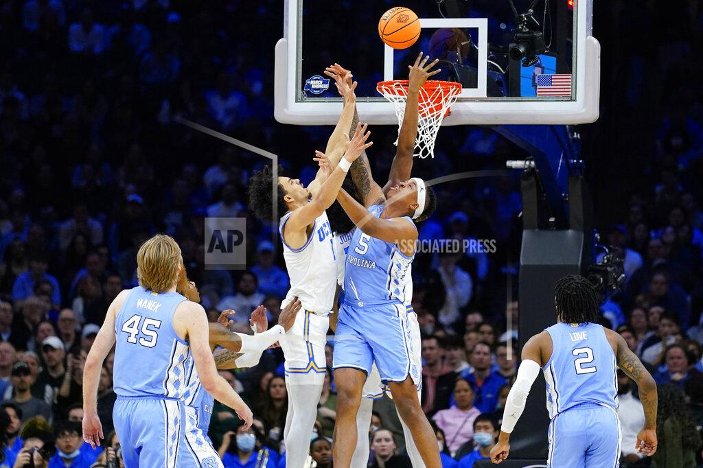Matt Rourke North Carolina's Armando Bacot (5) goes up for a rebound with UCLA's Jules Bernard (1) during the second half of a college basketball game in the Sweet 16 round of the NCAA tournament, Friday, March 25, 2022, in Philadelphia. (AP Photo/Matt Rourke)