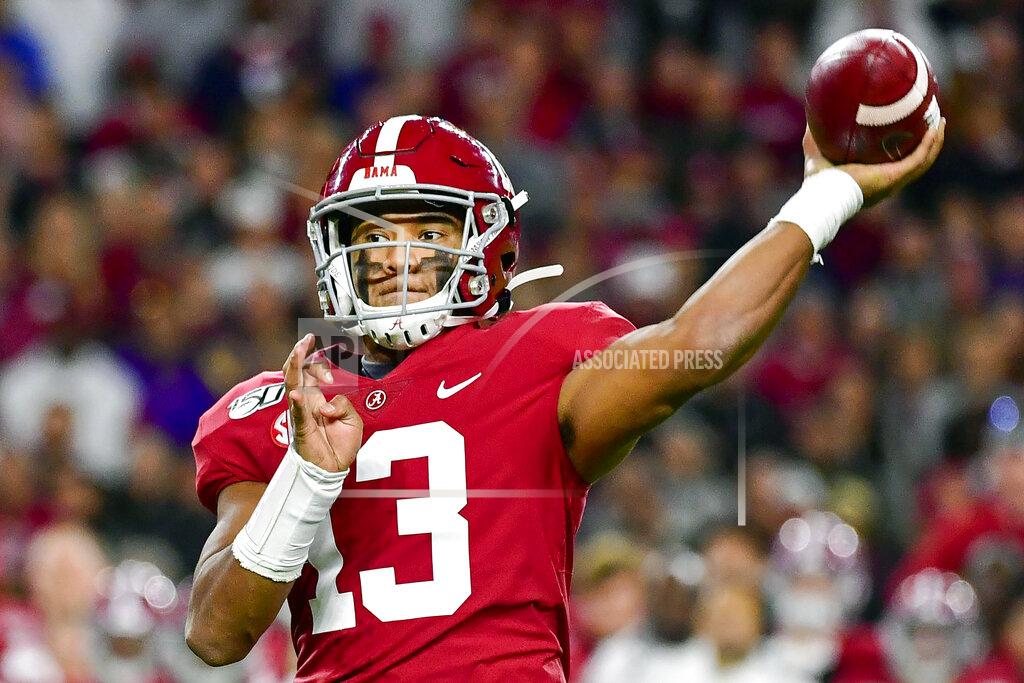 Vasha Hunt FILE - In this Nov. 9, 2019, file photo, Alabama quarterback Tua Tagovailoa passes during an NCAA college football game against LSU in Tuscaloosa, Ala. Tagovailoa is a rarity in the NFL: a left-handed quarterback, something the league hasn't had in several years. (AP Photo/Vasha Hunt, File)