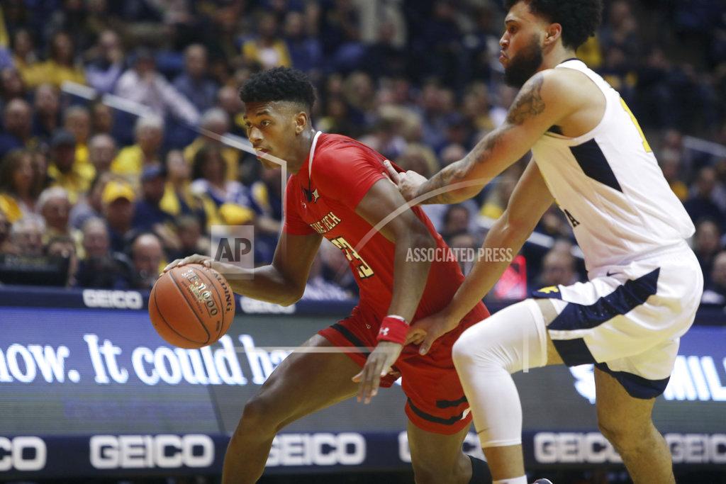 Ray Thompson Texas Tech guard Jarrett Culver (23) drives while defended by West Virginia guard Jermaine Haley (10) during the first half of an NCAA college basketball game Wednesday, Jan. 2, 2019, in Morgantown, W.Va. (AP Photo/Raymond Thompson)