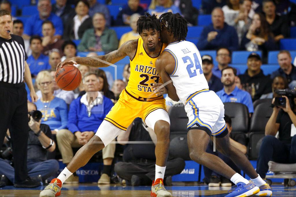 Ringo H.w. Chiu Arizona State forward Romello White (23) is defended by UCLA forward Jalen Hill (24) during the first half of an NCAA college basketball game Thursday, Feb. 27, 2020, in Los Angeles. (AP Photo/Ringo H.W. Chiu)