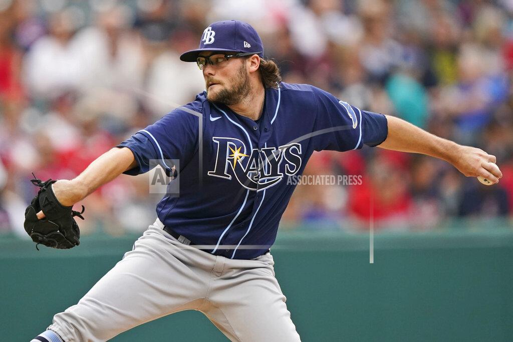 Tony Dejak Tampa Bay Rays starting pitcher Josh Fleming delivers in the first inning of the team's baseball game against the Cleveland Indians, Friday, July 23, 2021, in Cleveland. (AP Photo/Tony Dejak)