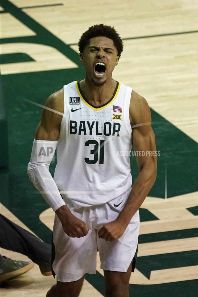 Chuck Burton Baylor's MaCio Teague (31) celebrates after making a basket and being fouled during the second half of an NCAA college basketball game against Auburn in Waco, Texas, Saturday, Jan. 30, 2021. (AP Photo/Chuck Burton)