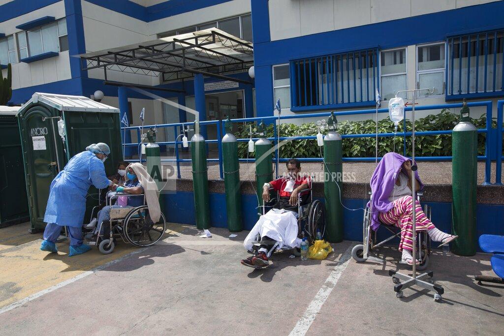 Rodrigo Abd People infected with COVID-19 disease wait for an available bed, outside a public hospital in Lima, Peru, Thursday, April 30, 2020. (AP Photo/Rodrigo Abd)