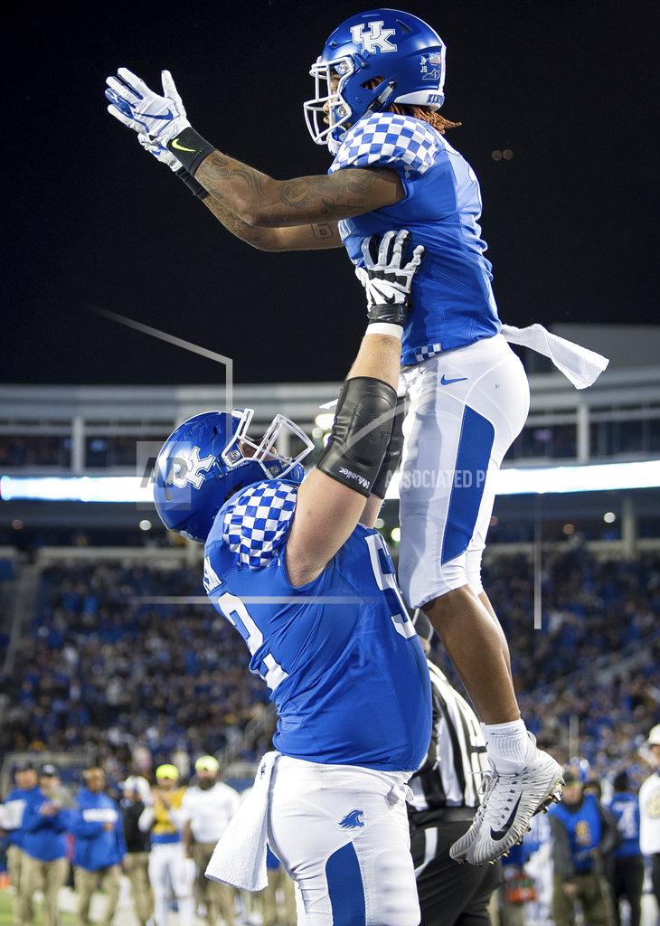 Bryan Woolston Kentucky center Drake Jackson (52) and wide receiver Lynn Bowden Jr. (1) celebrate following Bowden's touchdown during the first half of an NCAA college football game against Vanderbilt in Lexington, Ky., Saturday, Oct. 20, 2018. (AP Photo/Bryan Woolston)