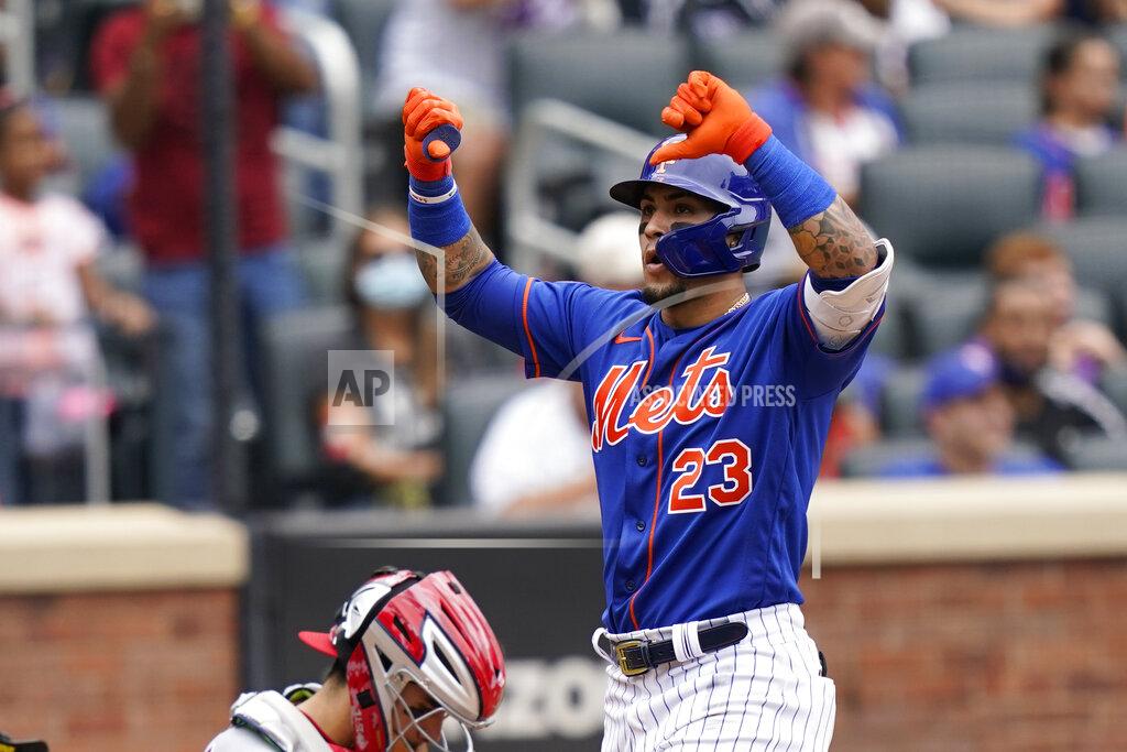 Corey Sipkin New York Mets' Javier Baez gestures at home plate after his two-run home run that also scored Michael Conforto during the fourth inning of a baseball game against the Washington Nationals, Sunday, Aug. 29, 2021, in New York. (AP Photo/Corey Sipkin)