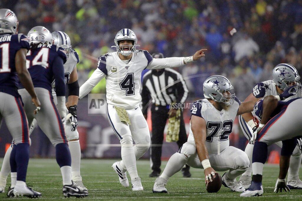 Elise Amendola Dallas Cowboys quarterback Dak Prescott calls signals at the line of scrimmage in the first half of an NFL football game against the New England Patriots, Sunday, Nov. 24, 2019, in Foxborough, Mass. (AP Photo/Elise Amendola)