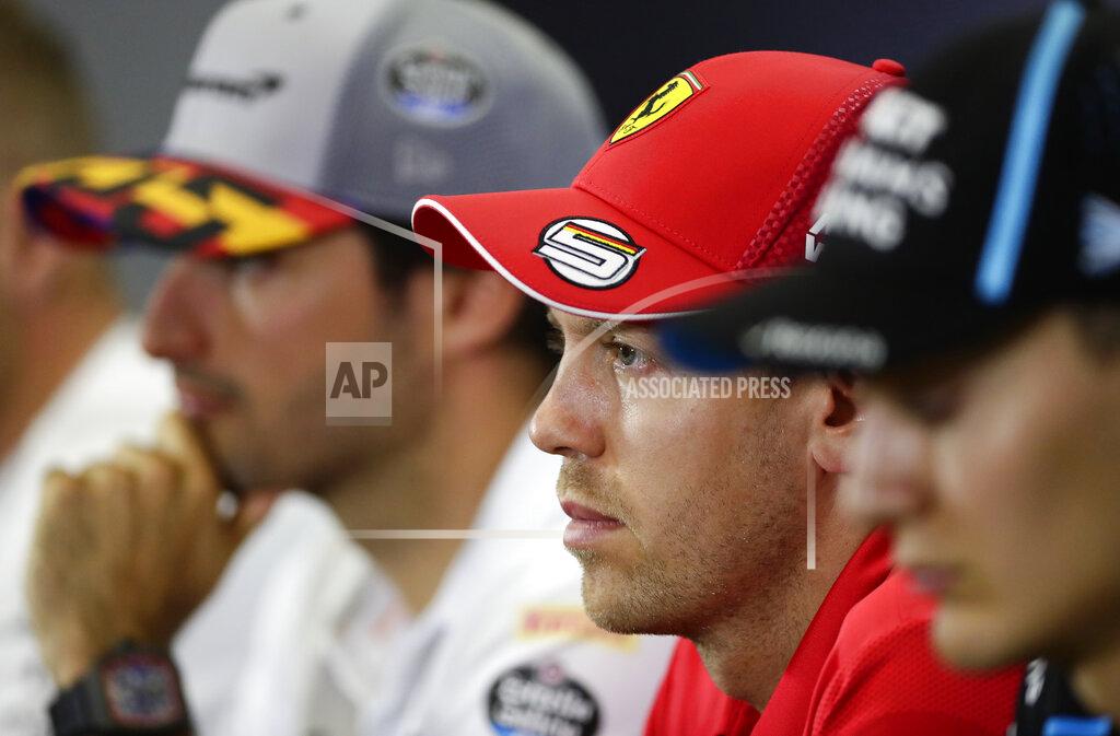 Manu Fernandez Ferrari's German driver Sebastian Vettel, center, attends during a press conference at the Barcelona Catalunya racetrack in Montmelo, Spain, Thursday, May 9, 2019. The Formula One race will be held on Sunday. (AP Photo/Manu Fernandez)