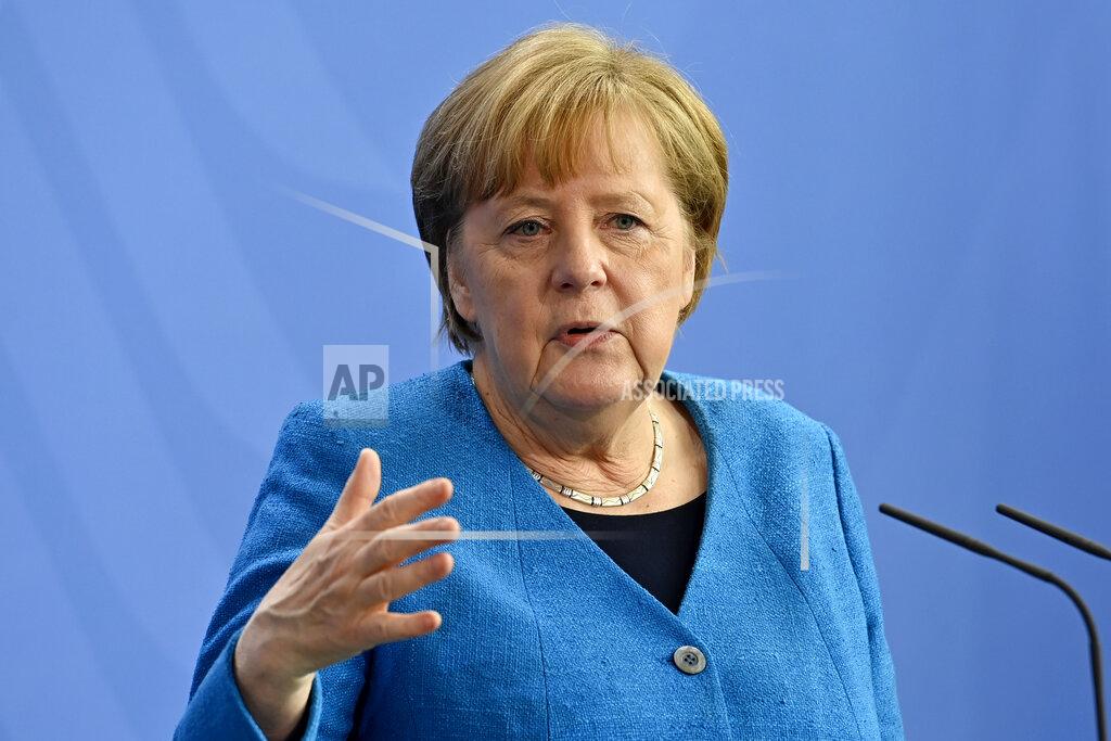 John Macdougall German Chancellor Angela Merkel attends a press conference after the informal EU summit and the EU-China summit in Berlin, Germany, Saturday, May 8, 2021. Merkel reiterated her stance that the shortage of vaccines worldwide would not be solved by a waiver of patents, as suggested by U.S. President Biden. (John MacDougall/Pool Photo via AP)