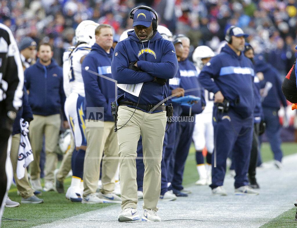 Steven Senne Los Angeles Chargers head coach Anthony Lynn walks on the sideline during the first half of an NFL divisional playoff football game against the New England Patriots, Sunday, Jan. 13, 2019, in Foxborough, Mass. (AP Photo/Steven Senne)
