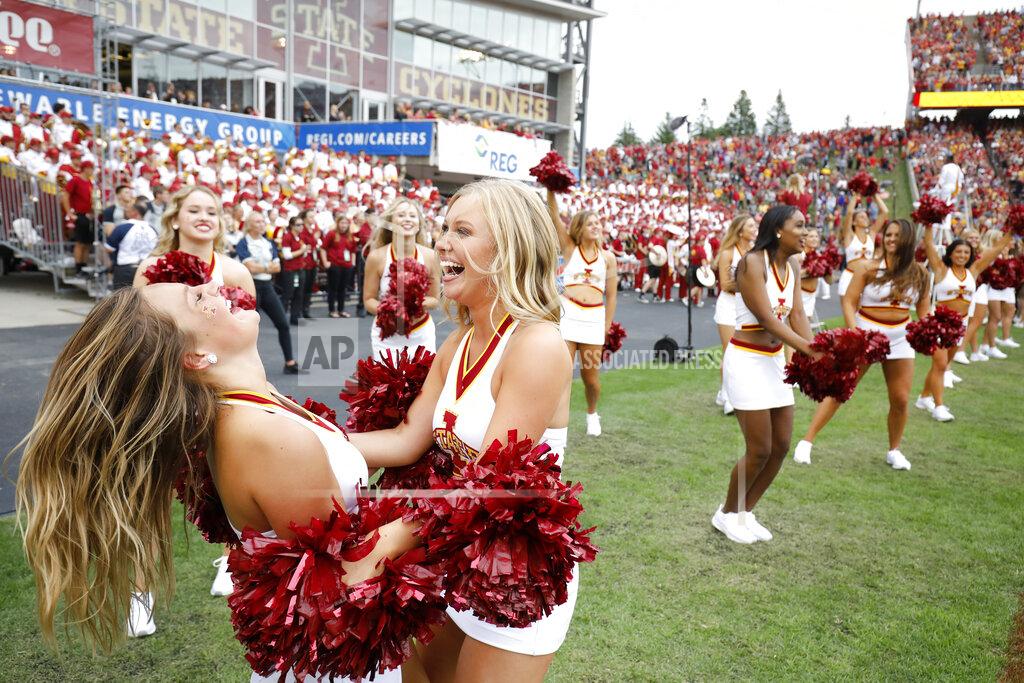 Iowa State cheerleaders celebrate a touchdown during the second overtime of an NCAA college football game against Northern Iowa, Saturday, Aug. 31, 2019, in Ames, Iowa. (AP Photo/Matthew Putney)