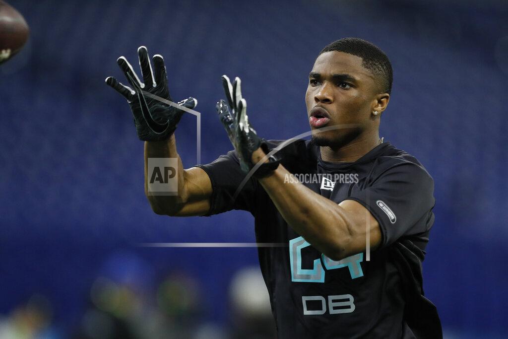 Charlie Neibergall FILE - In this March 1, 2020, file photo, Ohio State defensive back Jeff Okudah runs a drill at the NFL football scouting combine in Indianapolis. Okudah is a likely first-round pick in the NFL draft Thursday, April 23, 2020. (AP Photo/Charlie Neibergall, File)