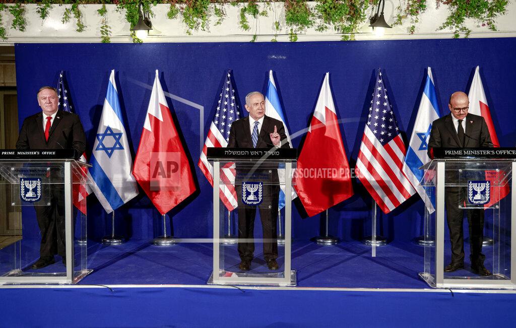 Menahem Kahana From left to right, U.S. Secretary of State Mike Pompeo, Israeli Prime Minister Benjamin Netanyahu and Bahrain's Foreign Minister Abdullatif bin Rashid Alzayani hold a press conference after their trilateral meeting in Jerusalem on Wednesday, Nov. 18, 2020. (Menahem Kahana/Pool via AP)
