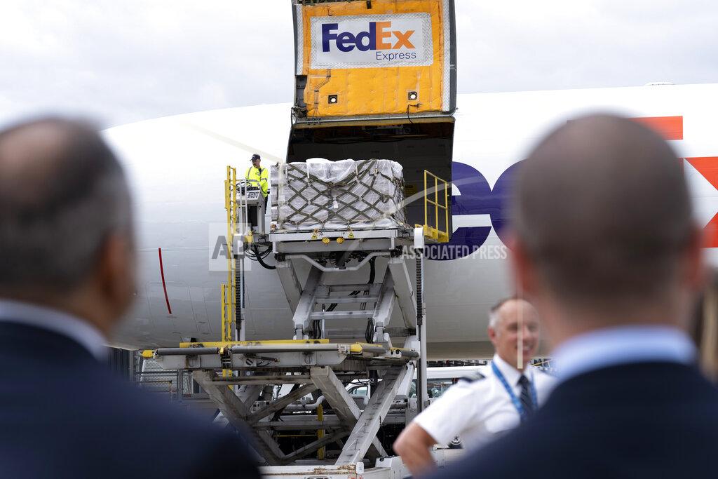 Jose Luis Magana Workers unload a Fedex Express cargo plane carrying 100,000 pounds of baby formula at Washington Dulles International Airport, in Chantilly, Va., on Wednesday, May 25, 2022. (AP Photo/Jose Luis Magana)